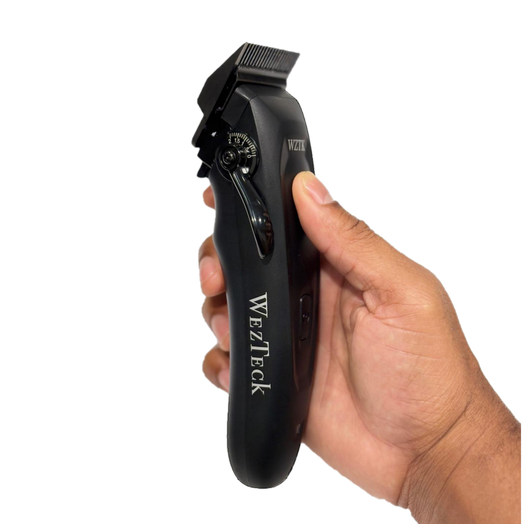 Holding the WezTeck Hair Clipper, showing the ergonomic grip and lever